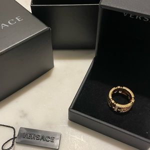 Gold-coloured Versace ring with crystals